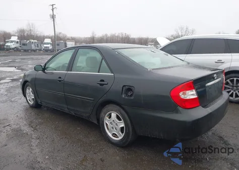 2003 Toyota Camry Le V6 z USA, uszkodzony, nr VIN 4T1BF30K23U549573
